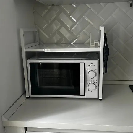 By Apartment